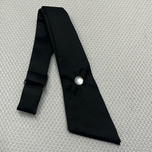 Female Cross Over. Popular for women’s uniforms. Black with pearl like button.